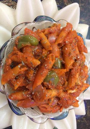 A picture of Hot and spicy Red sauce pasta.