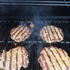 A picture of Homemade beef burgers.