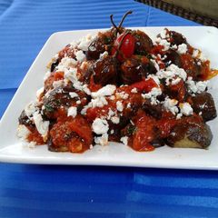 A picture of Mini Eggplants with Tomato Feta Sauce.