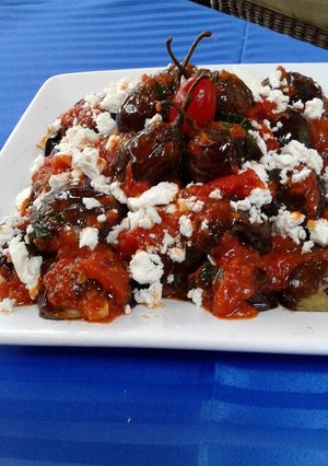 A picture of Mini Eggplants with Tomato Feta Sauce.