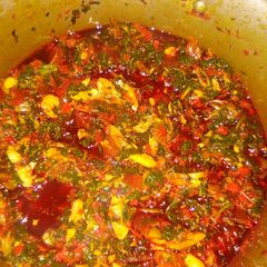 A picture of Green (Efo) and rice.