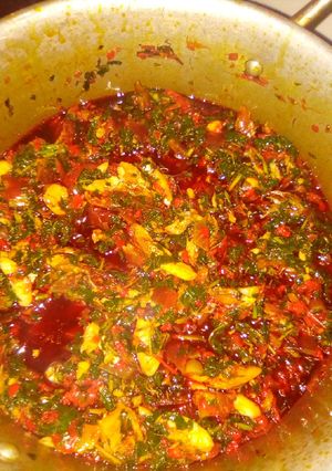 A picture of Green (Efo) and rice.
