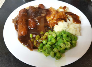 A picture of My Sausage in Onion Gravy with Creamy Mashed Potato & Peas. 😘.