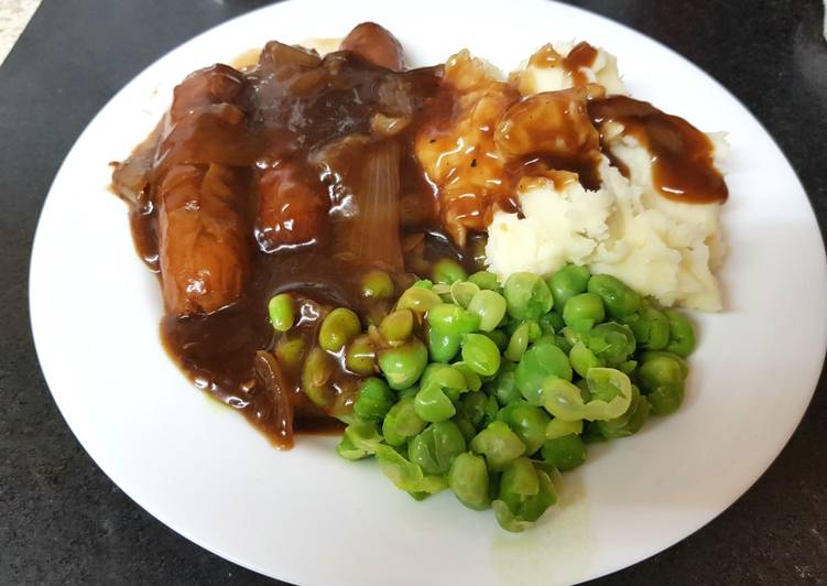 Recipe of Perfect My Sausage in Onion Gravy with Creamy Mashed Potato & Peas. 😘