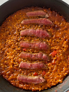 Una foto de Arroz seco de presa ibérica