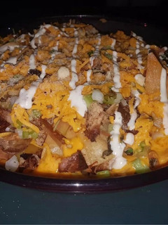 Una foto de Nachos de Pierna de Cerdo Asado