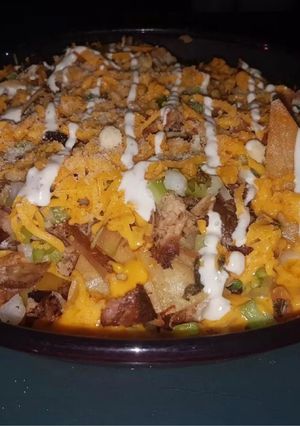 Una foto de Nachos de Pierna de Cerdo Asado