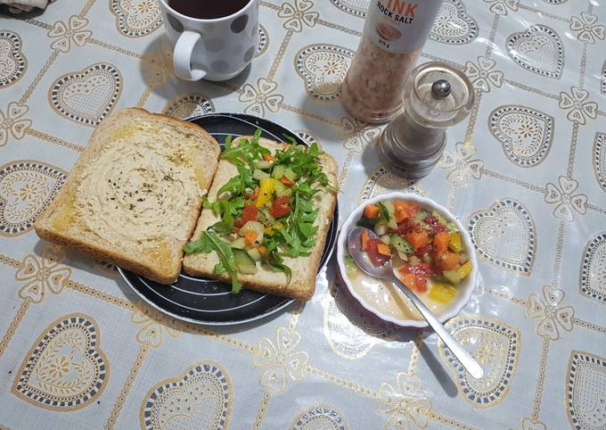 Humus sandwich with rocket and crunchy bright salad