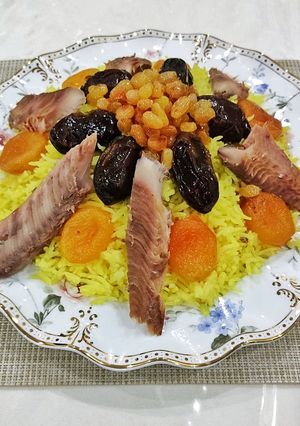 A picture of Milky pilaf with salty fish.