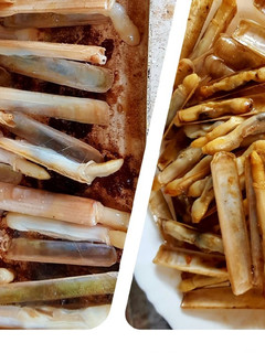 Una foto de Canyuts (navajas) a la plancha con aceite de gambas