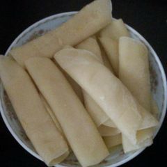 A picture of Sweet pancake with coconut filling.