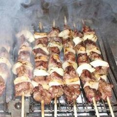 A picture of Grilled meat cubes on skewers - lahem meshwi.
