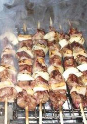 A picture of Grilled meat cubes on skewers - lahem meshwi.