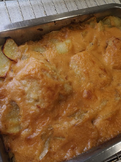 Una foto de Bacalao a la portuguesa 🇵🇹 con patatas asadas