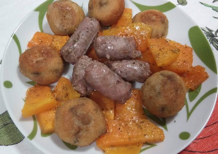 Salsiccia, polpette di melanzane e zucca al forno