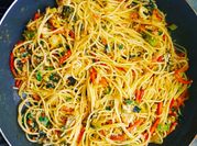 A picture of spaghetti with leeks