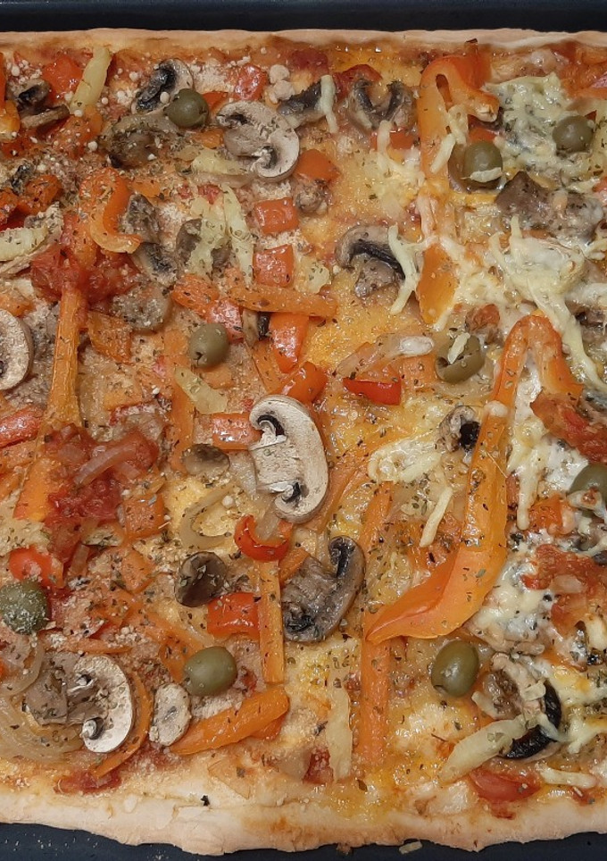 Una foto de Pizza de lo que haya