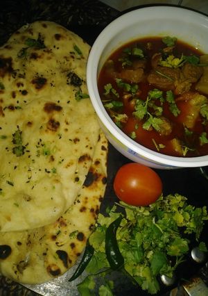 A picture of Garlic butter naan.