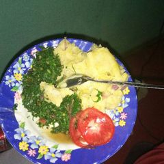 Mashed banana/potatoes and fried kales A picture of Mashed banana/potatoes and fried kales.