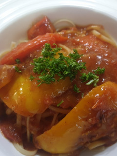 A picture of Peppers in a tomato sauce.