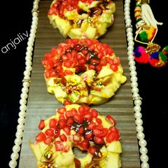 Pineapple Doughnut with saffron Rabdi A picture of Pineapple Doughnut with saffron Rabdi.