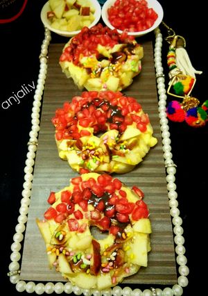 A picture of Pineapple Doughnut with saffron Rabdi.