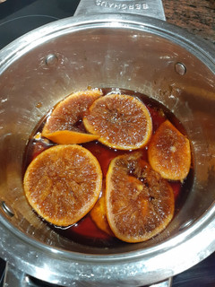 Una foto de Naranjas confitadas