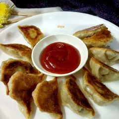 A picture of Pan fried dumplings.