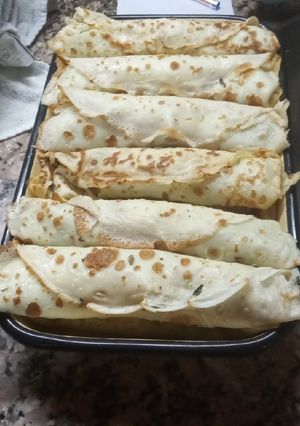 Una foto de Canelones de acelga y carne molida