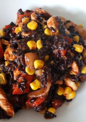 A picture of Spicy chicken, veg and black rice one pan.