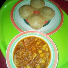 A picture of Alkubus with cabbage nd potatoes soup.