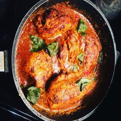 A picture of Spicy, Succulent Chicken Breasts in a Tomato and Red Wine Sauce.