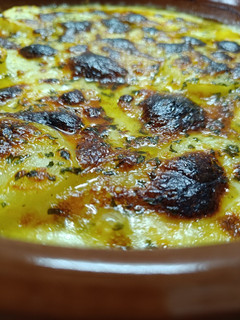 Una foto de Patatas con queso (monte veronese) al horno