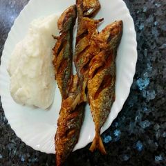 A picture of Ugali and fried. Lemon fish.