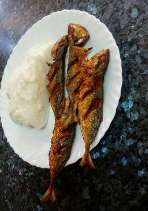 A picture of Ugali and fried. Lemon fish.