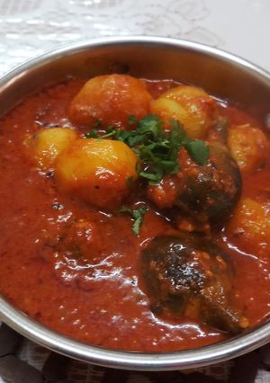 A picture of Stuffed Brinjals and Baby Potatoes Sabzi.