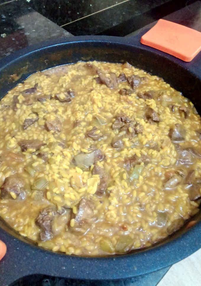Una foto de Arroz con higaditos de pollo