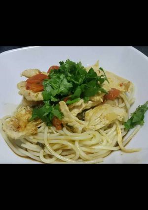 A picture of Chicken with a Mexican-inspired salsa.
