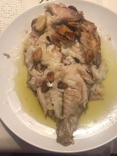 Una foto de Besugo al horno