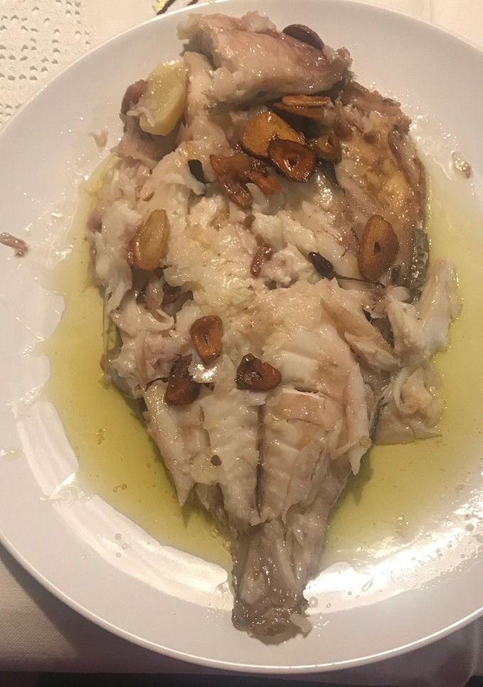 Una foto de Besugo al horno