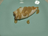 Calamar plancha en cebolla caramelizada