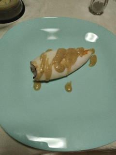 Una foto de Calamar plancha en cebolla caramelizada