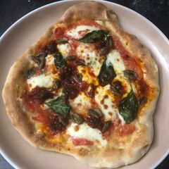 Neapolitan pizza (including the dough) A picture of Neapolitan pizza (including the dough).