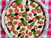 Una foto de queso provolone tomates cherry