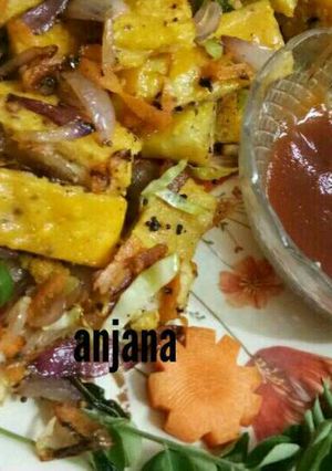 A picture of Baked bread pakoda with veggies tadka.