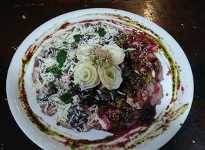 Una foto de Trío de carpaccio