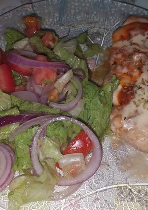 Una foto de Pata muslo a la pizza en la Planchetta