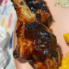 A picture of Grilled BBQ chicken legs.