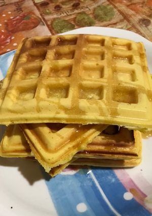 Una foto de Waffles con helado de Vainilla