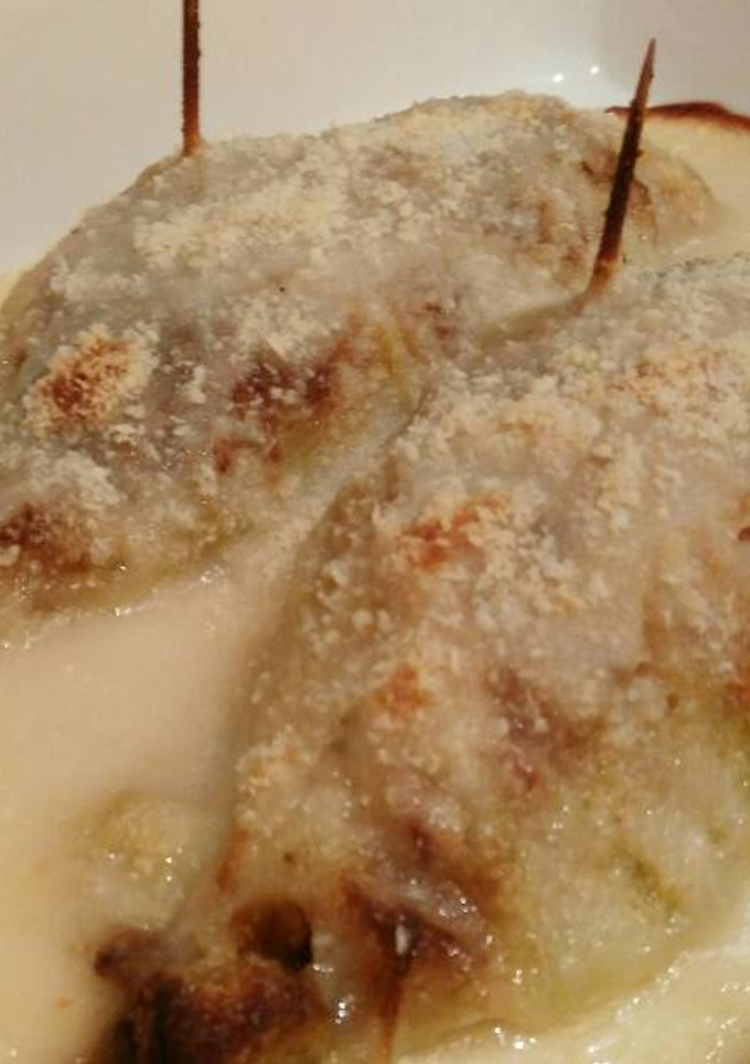 Una foto de Canelones de col